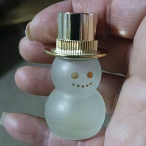 Vintage Snowman Avon miniature cologne bottle